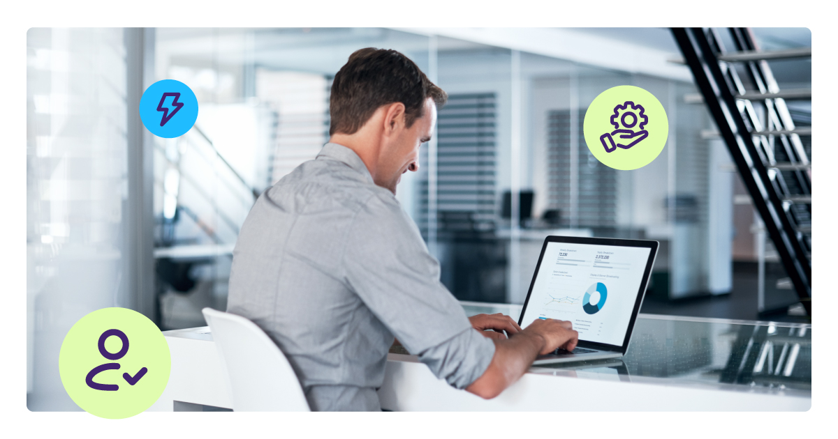 Image of a man using an automated risk scoring system to underwrite his merchants