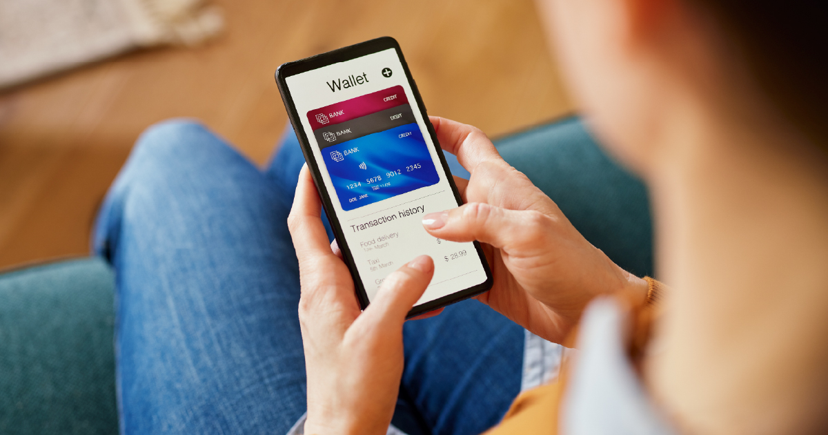 Person uses phone to make a recurring payment