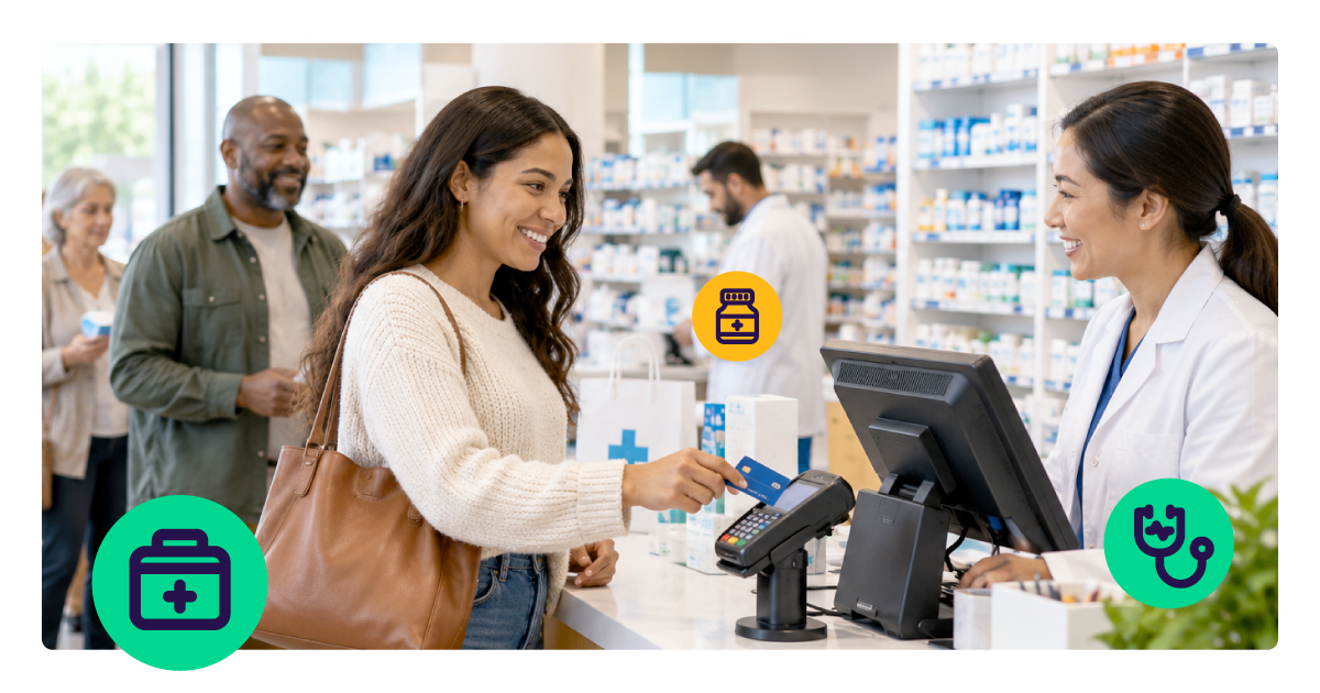 A customer taps a payment card on a card reader at a pharmacy counter while a pharmacist assists her, with other shoppers waiting in line behind her.